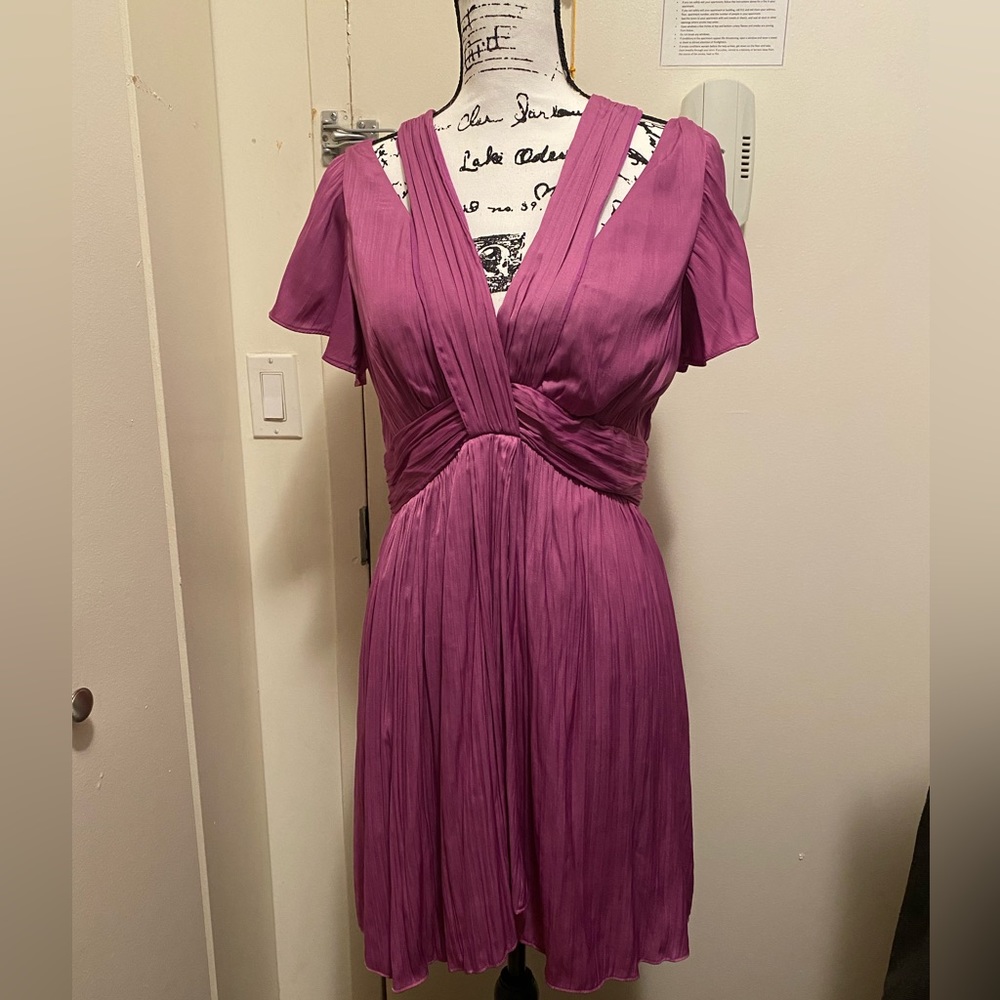 Anthropologie Fuschia dress retails for $148